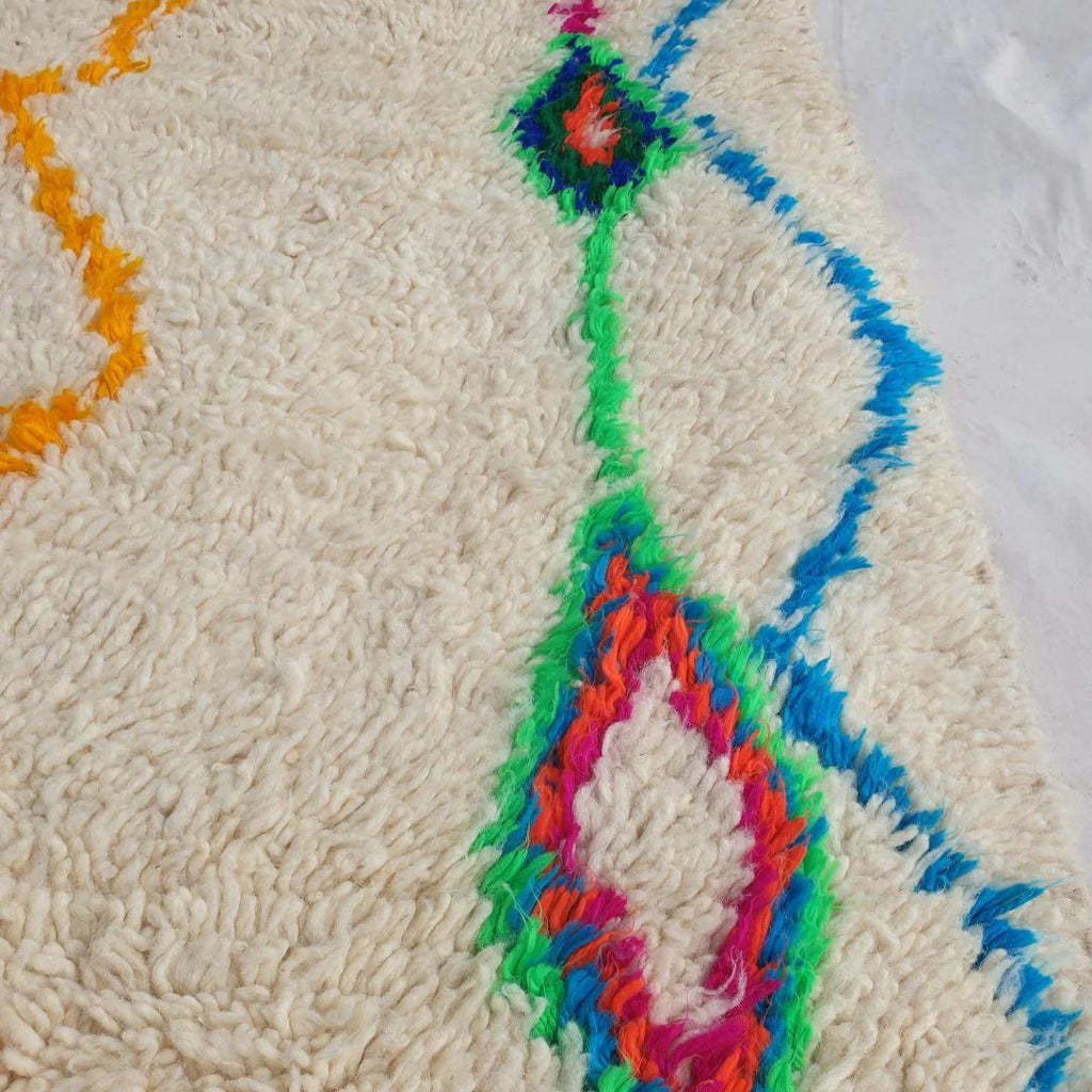 Handmade Moroccan Azilal Wool Rug: Vibrant Tribal Design