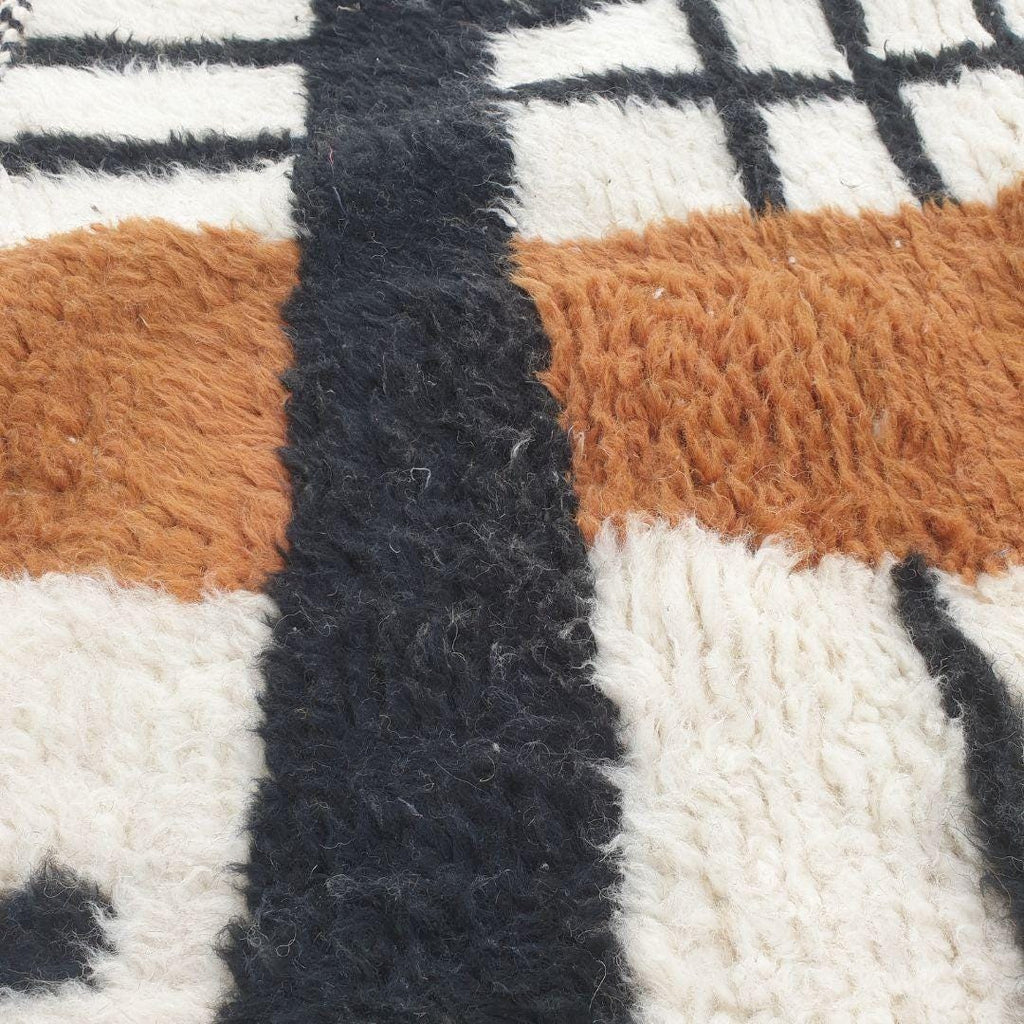 Handmade Beni Ourain Wool Rug: Moroccan Grid Design