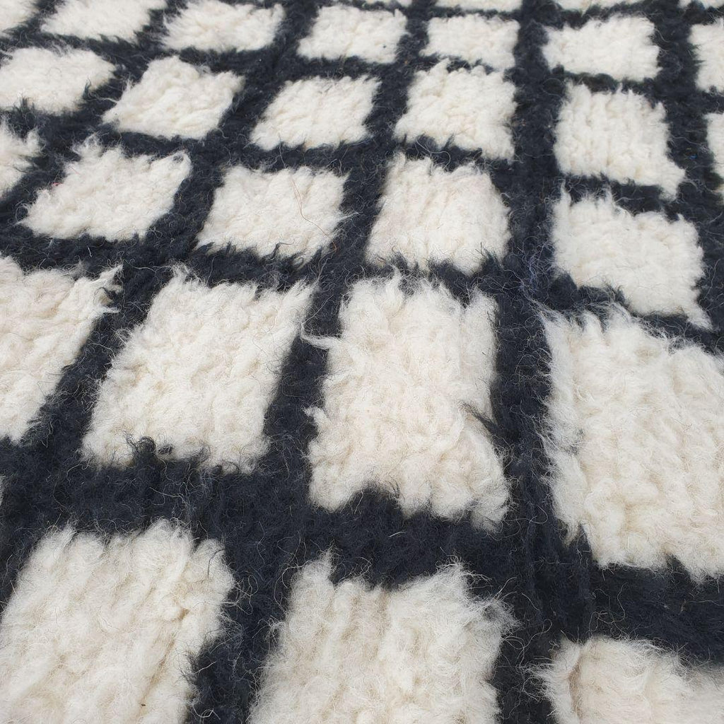 Handmade Beni Ourain Wool Rug: Moroccan Grid Design