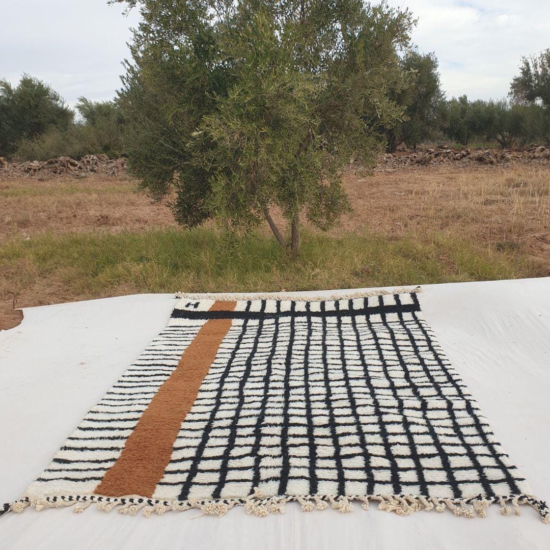 Handmade Beni Ourain Wool Rug: Moroccan Grid Design