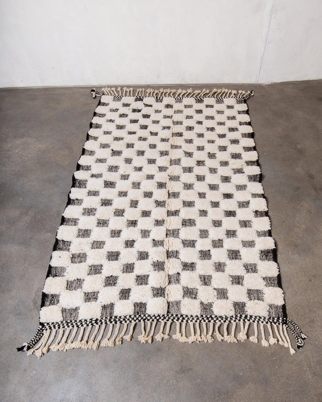 Handwoven Wool Checkered Rug: Moroccan Berber Design