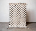 Handwoven Wool Checkered Rug: Moroccan Berber Design