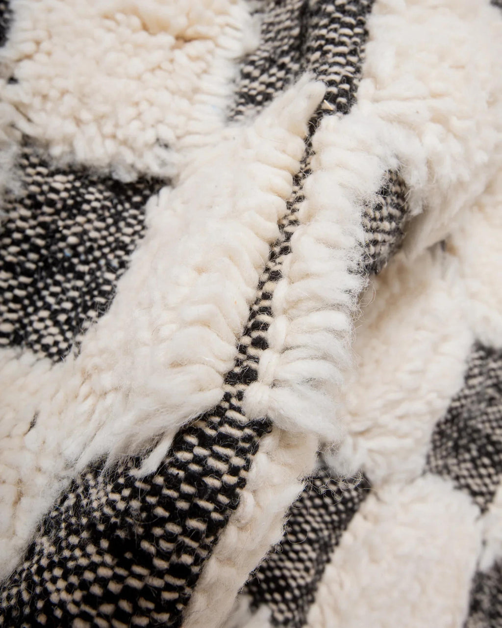 Handwoven Wool Checkered Rug: Moroccan Berber Design