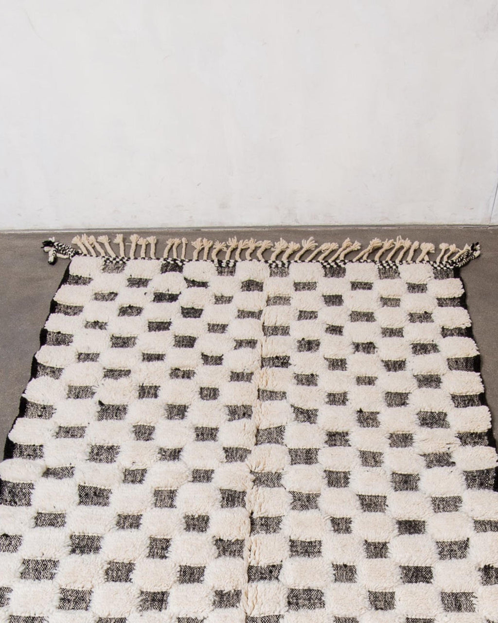 Handwoven Wool Checkered Rug: Moroccan Berber Design