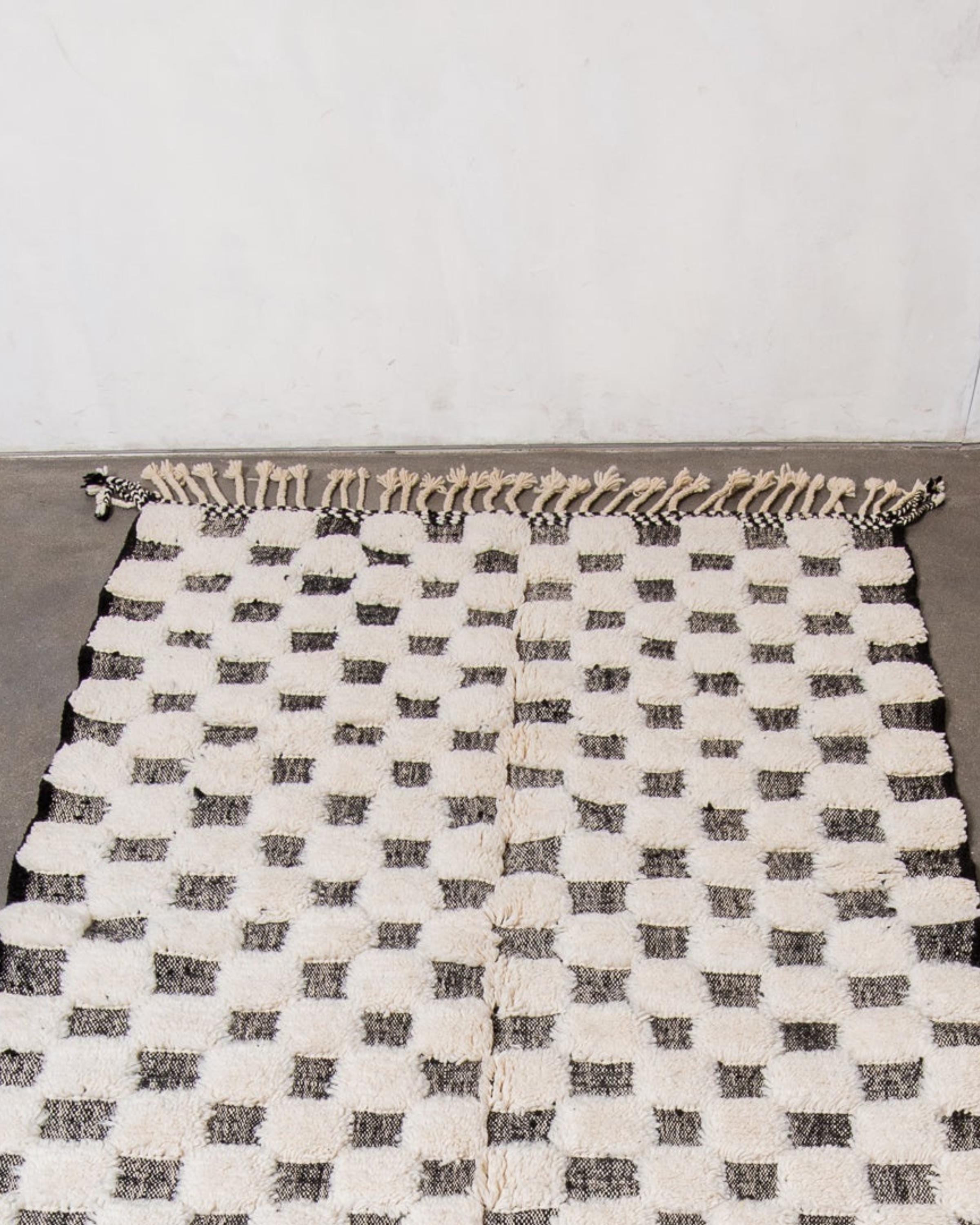 Handwoven Wool Checkered Rug: Moroccan Berber Design